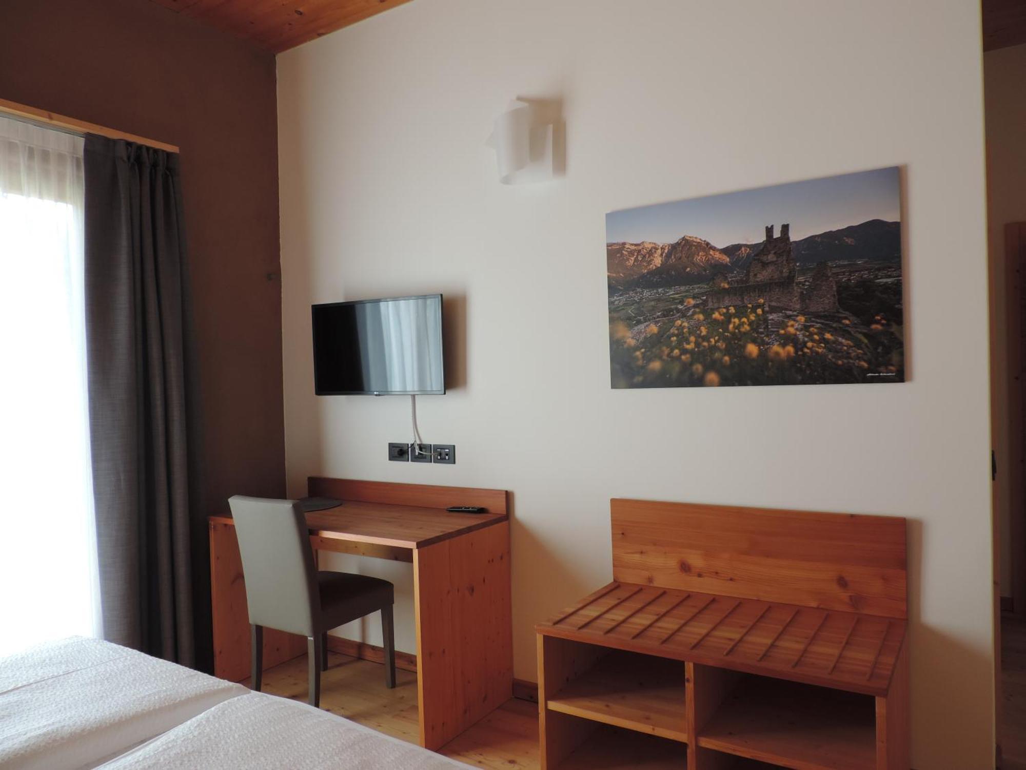 Hotel Garni Tuttotondo Levico Terme Habitación foto