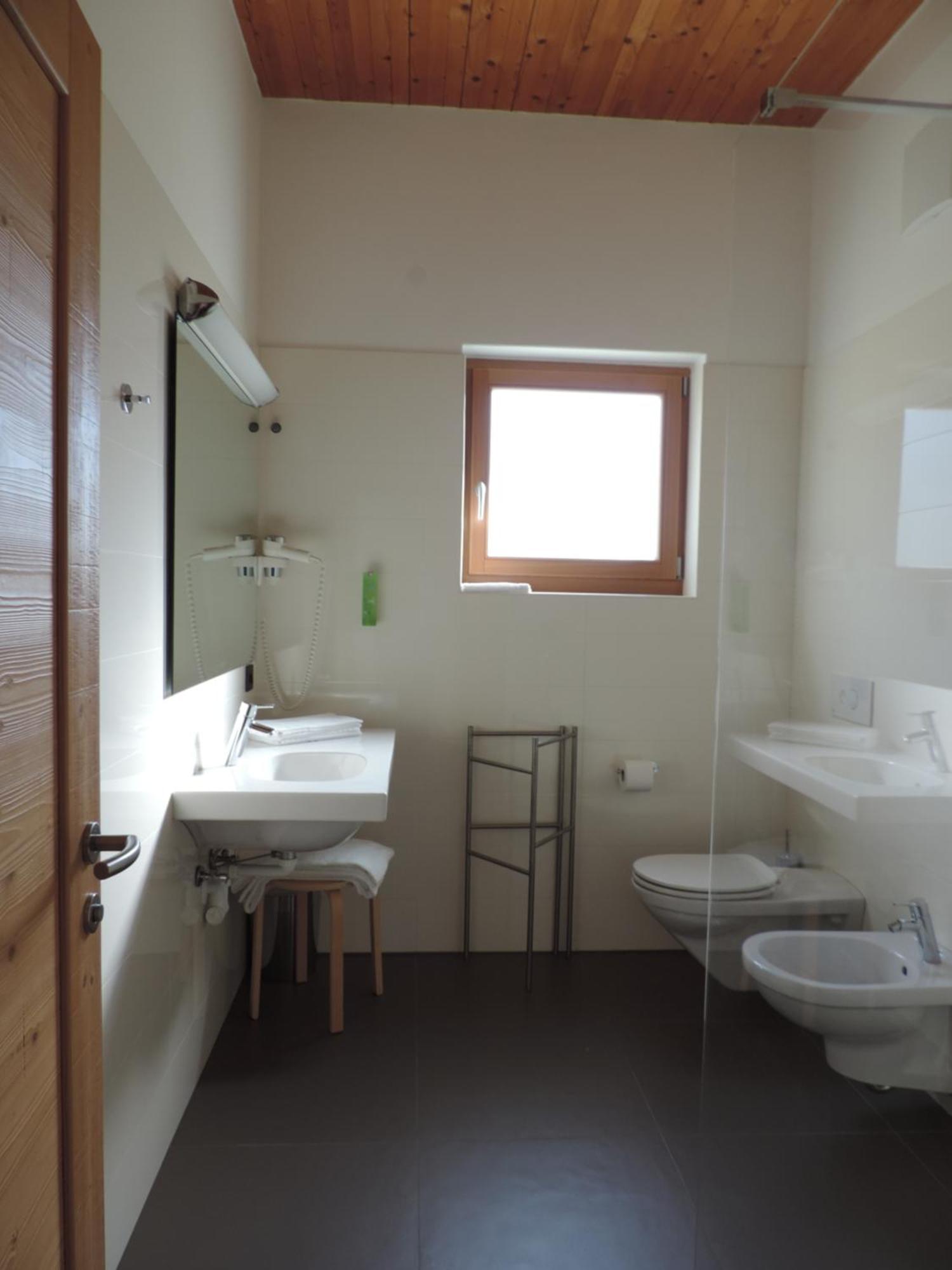 Hotel Garni Tuttotondo Levico Terme Habitación foto