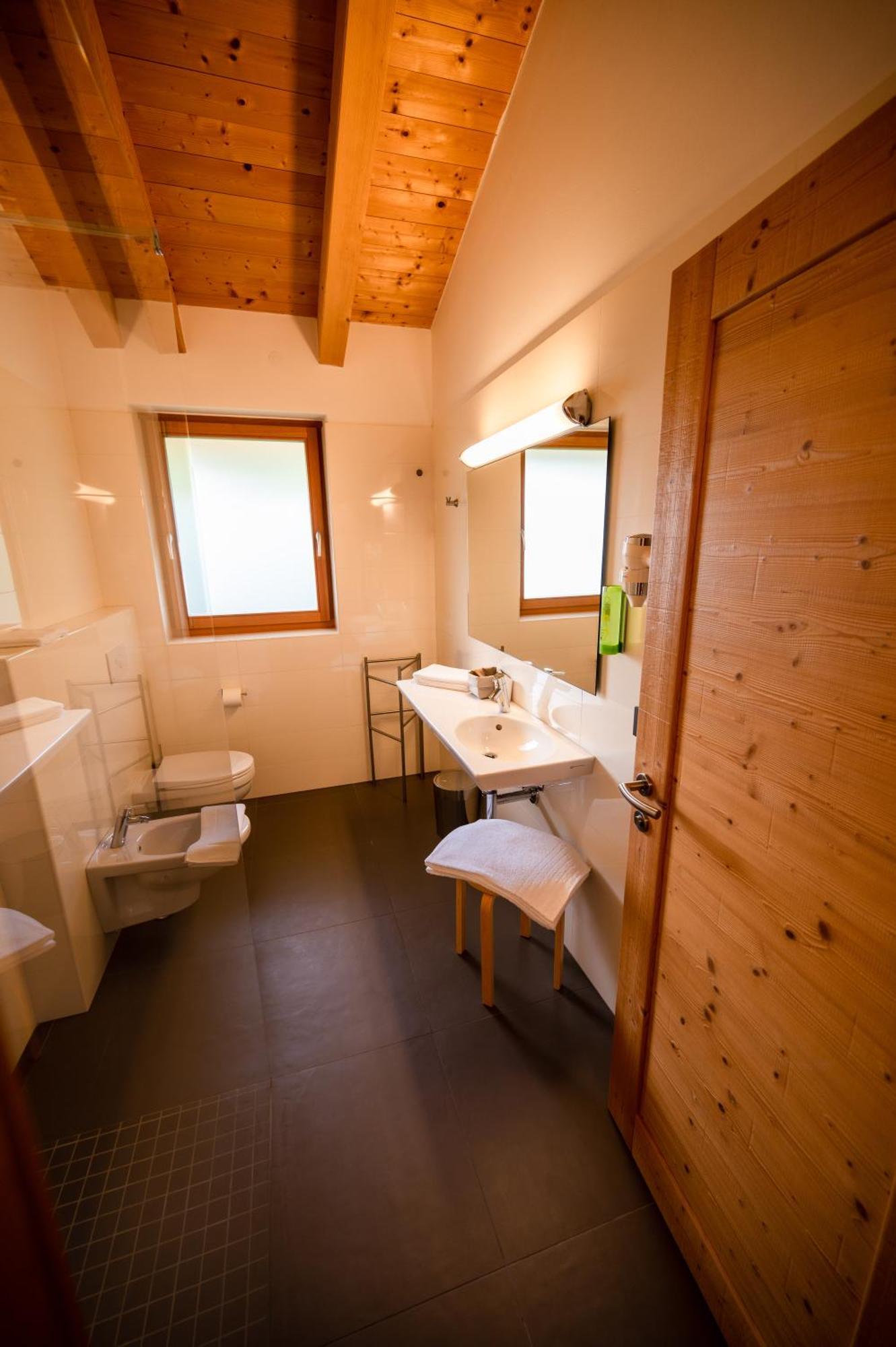 Hotel Garni Tuttotondo Levico Terme Habitación foto